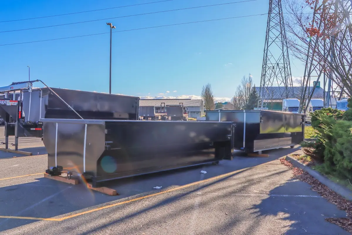 Roll-off dumpster ready for waste disposal at job site for 2 Yard Dumpster Rental in Ashland